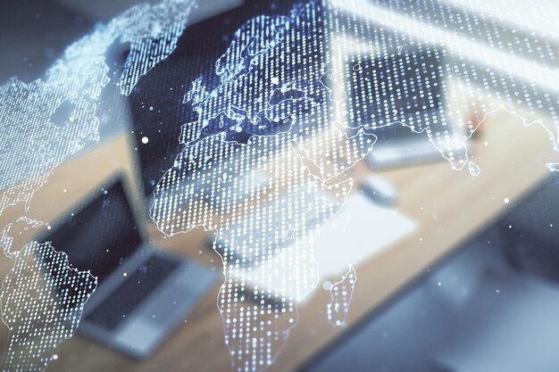 Mapa del mundo creativo abstracto y escritorio moderno con computadora en el concepto de comercio internacional de fondo Multiexposición