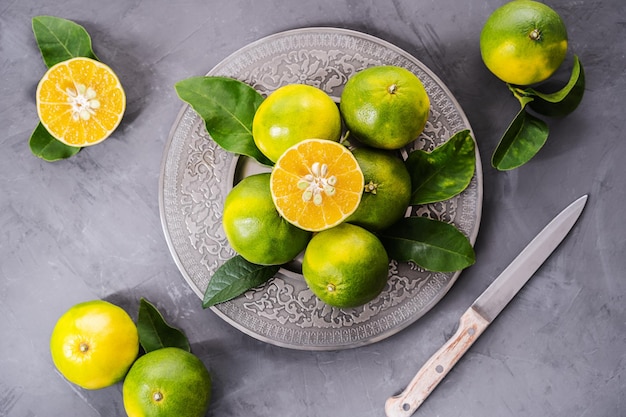 Mapo é um híbrido de tangerina e toranja É uma fruta de baixa caloria é fonte de vitaminas