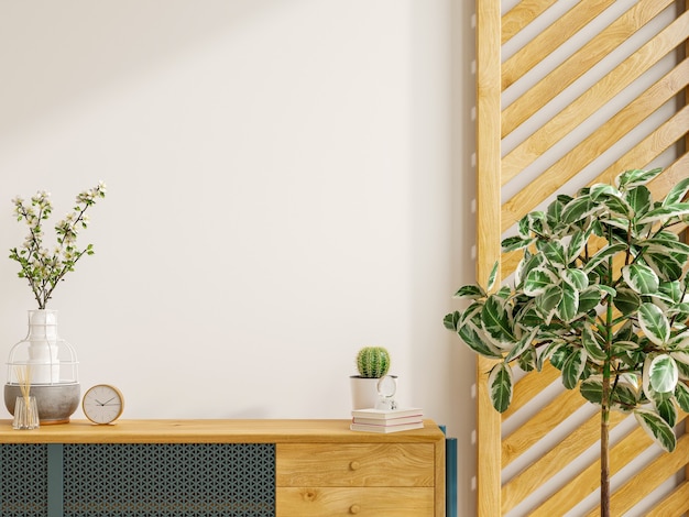 Maqueta de un gabinete en una habitación contemporánea y vacía con una pared blanca Representación 3D