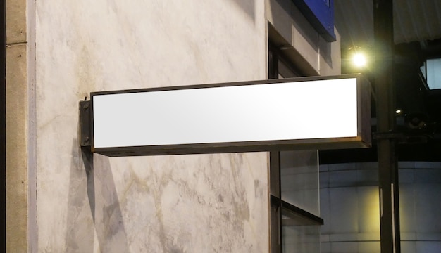 Maqueta de letrero de tienda en blanco Plantilla de caja de luz de tienda iluminada vacía montada en la paredxA