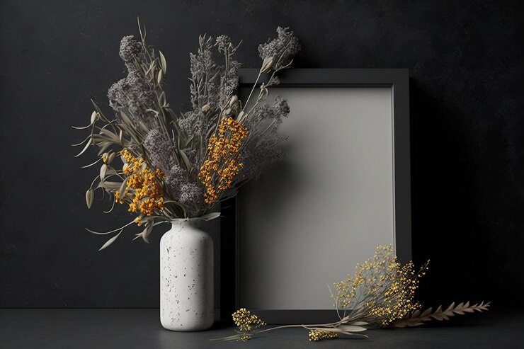 Maqueta de marco vertical delgado negro junto a jarrón de hormigón con flores secas sobre pared gris Ai generativo