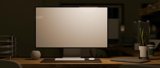 Foto maqueta moderna de la pantalla blanca de la computadora de la pc en el escritorio de trabajo en la representación oscura de la sala de oficina 3d