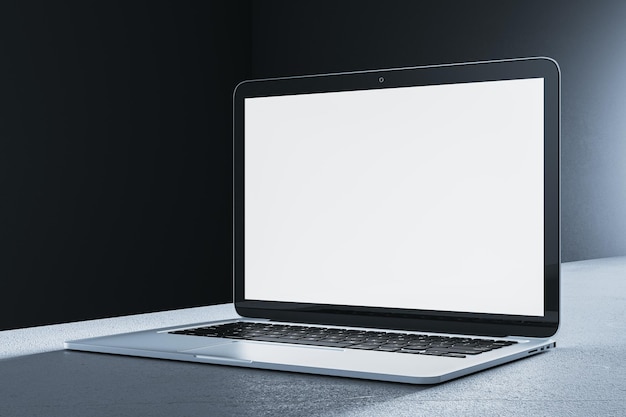 Maqueta de pantalla de portátil con pantalla en blanco en una mesa gris en interiores Renderización 3D