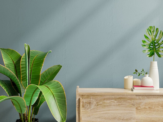 Maquete da parede interna com planta verde, parede azul escuro e prateleira Renderização 3D