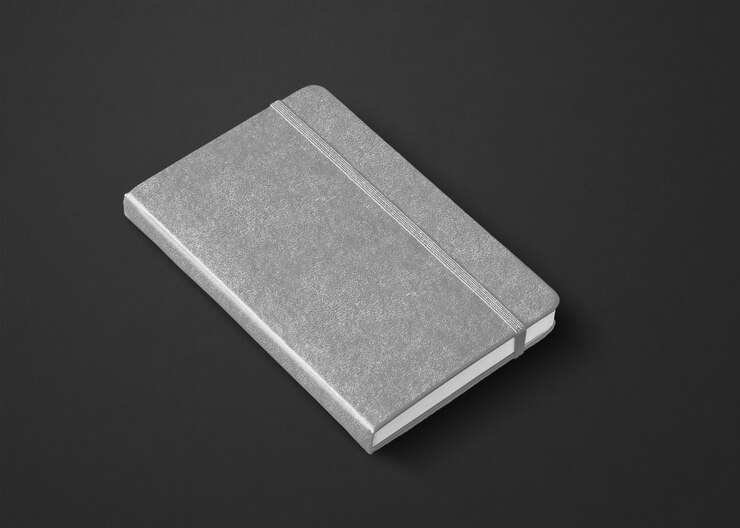 Foto maquete de caderno cinza fechado isolado no preto