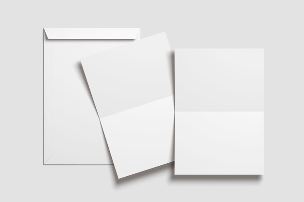 Maquete de envelope e folhas em fundo cinza