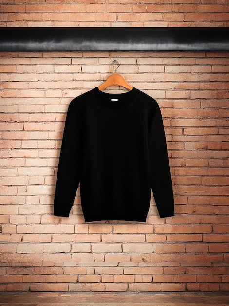 Maquete de suéter preto pendurado com imagem de fundo de tijolo