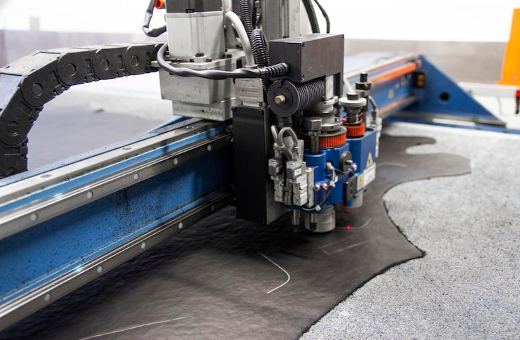 Foto máquina cnc para el corte de tejidos materiales textiles y cuero