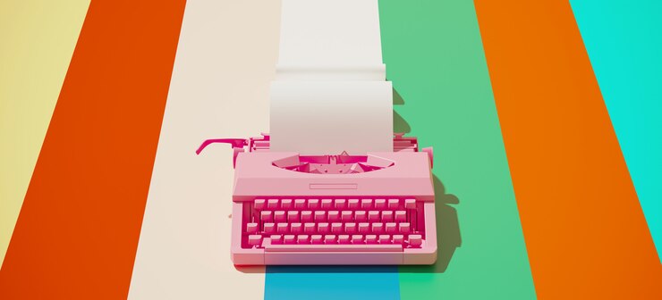Máquina de escrever vintage rosa e rolo de papel em fundo colorido