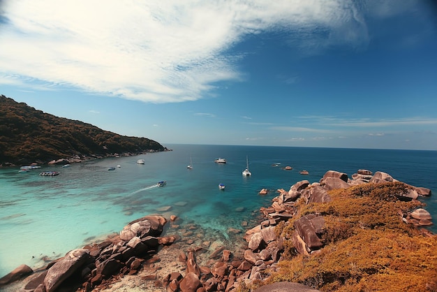 mar cielo isla barcos sol