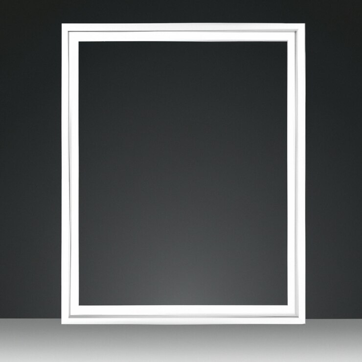 Un marco blanco con un borde blanco está contra una pared negra