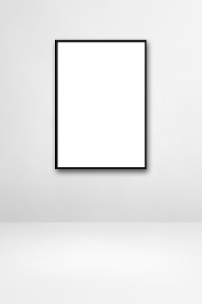 Marco de imagen negro colgado en una pared blanca. Plantilla de maqueta en blanco