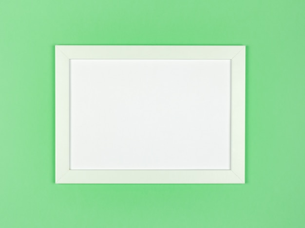 Marco de imagen plano sobre fondo de papel de color pastel con textura
