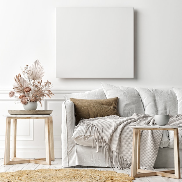 Marco de póster de maqueta en la pared, un sofá blanco en la sala de estar escandinava, representación 3d, ilustración 3d