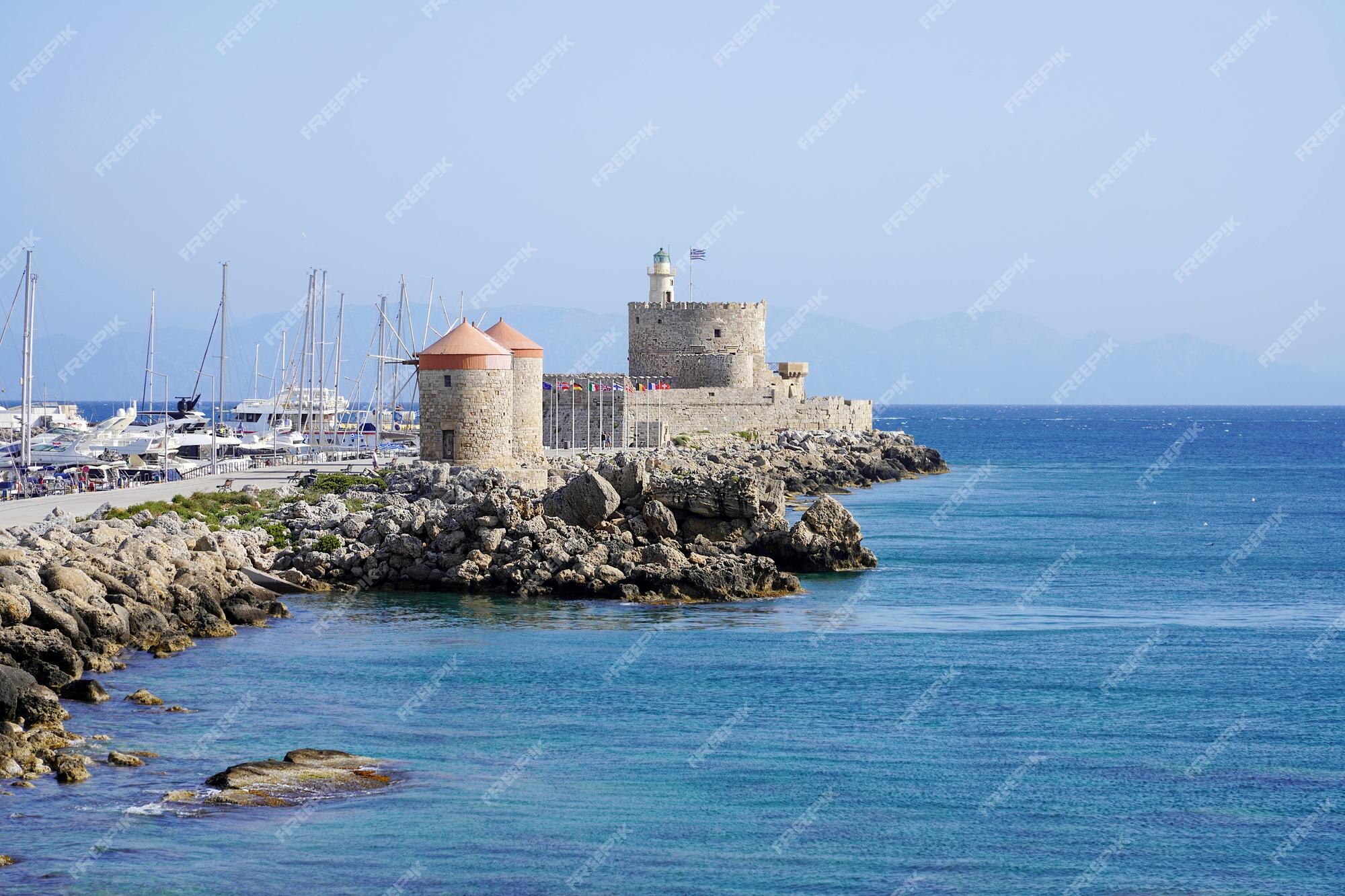 Fundo Moinho De Vento Tradicional Em Mandraki Harbourrhodes Verão Medieval  Castelo De São Nicolau Foto E Imagem Para Download Gratuito - Pngtree