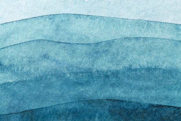Marineblaue Farben des abstrakten Kunsthintergrunds. Aquarellmalerei auf Leinwand mit türkisfarbenem Muster der Meereswellen.