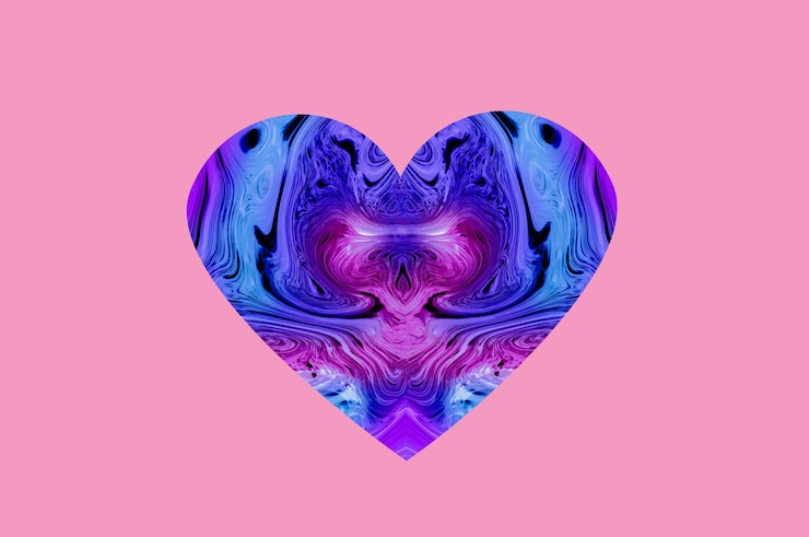 Foto mármol en forma de corazón sobre fondo rosa para el día de san valentín