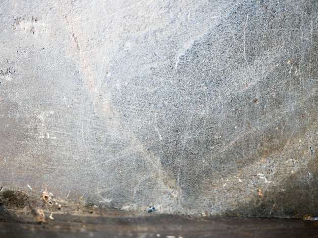 Mármol viejo en mal estado. Vieja textura de piso sucio, fondo de muro de hormigón gris