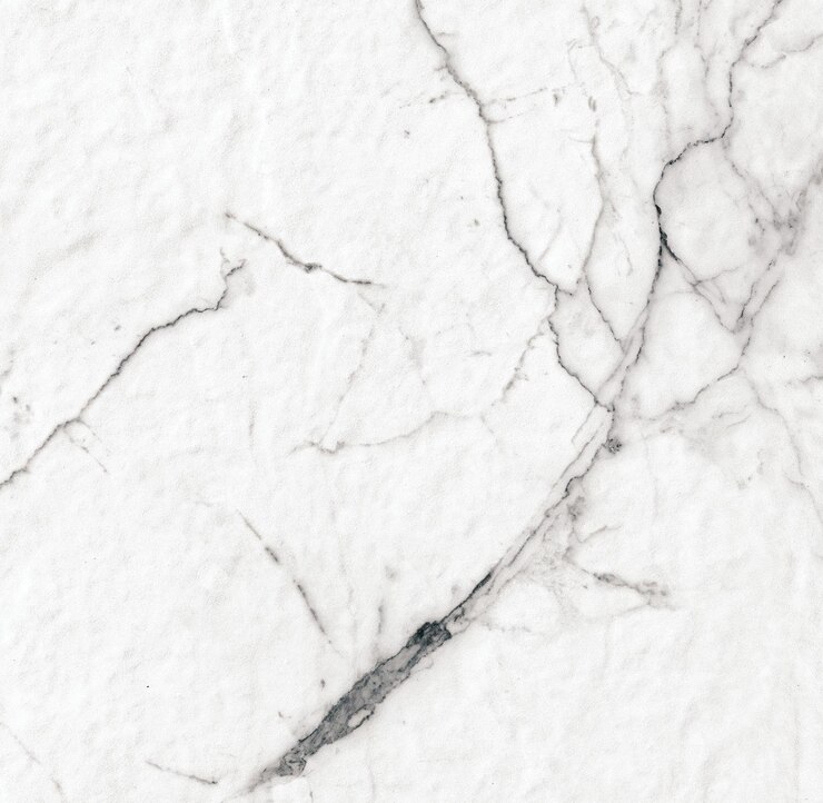 Foto mármore branco com uma mancha preta nele
