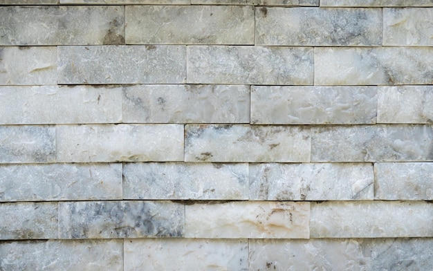Foto marmorwand es ist ein block wie ein ziegelstein für die herstellung von wänden oder gipswänden als hintergrund oder tapete