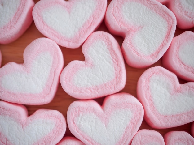 Foto marshmallow em forma de coração rosa para plano de fundo dia dos namorados