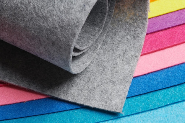 Material têxtil de feltro macio multicolorido closeup de tecido de textura de patchwork colorido