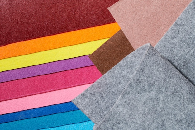 Material têxtil de feltro macio multicolorido closeup de tecido de textura de patchwork colorido
