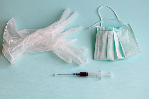 Medicamentos, máscaras faciais e luvas médicas de CORONAVIRUS. Vacina contra coronavírus. Novo Coronavírus 2019-COVID, Síndrome Respiratória de Coronavírus.
