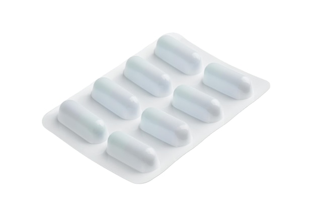 medicamentos píldora blanca sobre un fondo claro