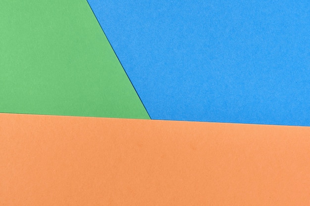 Mehrfarbiger Papierhintergrund. Abstrakte bunte Papierbeschaffenheit, Kopienraum. Helle Farben für geometrischen Hintergrund des Designs. Farbe leer für Präsentationen.