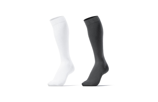 Foto meias de futebol pretas e brancas com o dedo do pé meio virado. calcinhas ou meias elásticas. futebol claro.
