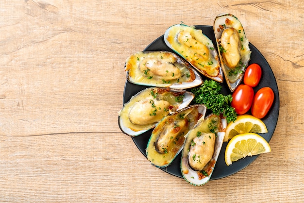 Foto mejillón al horno con queso