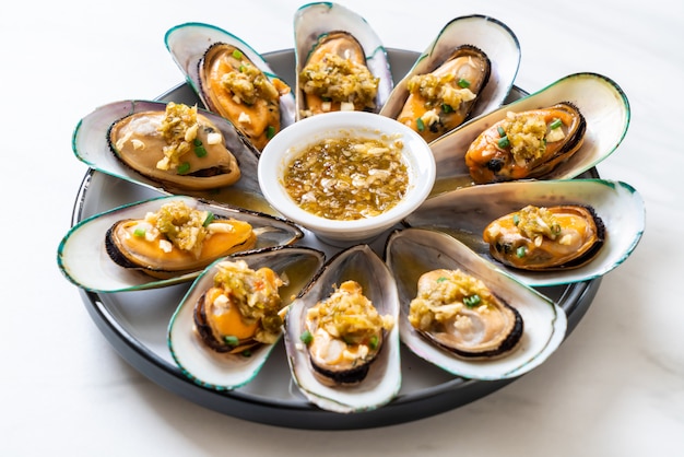 mejillones con salsa picante de mariscos