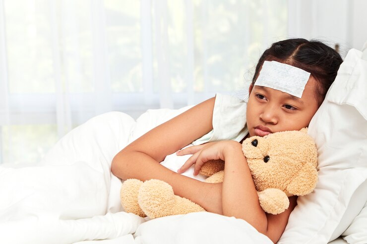 Foto menina asiática dormindo no hospital