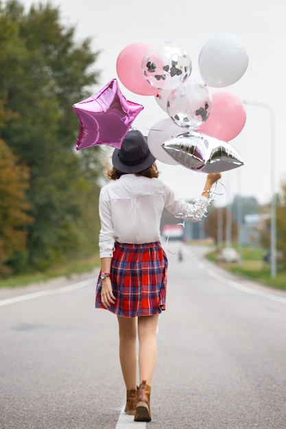 Foto menina com balão