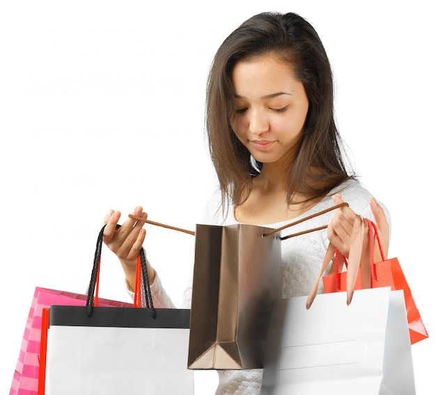 Menina, com, bolsas para compras, branco, fundo