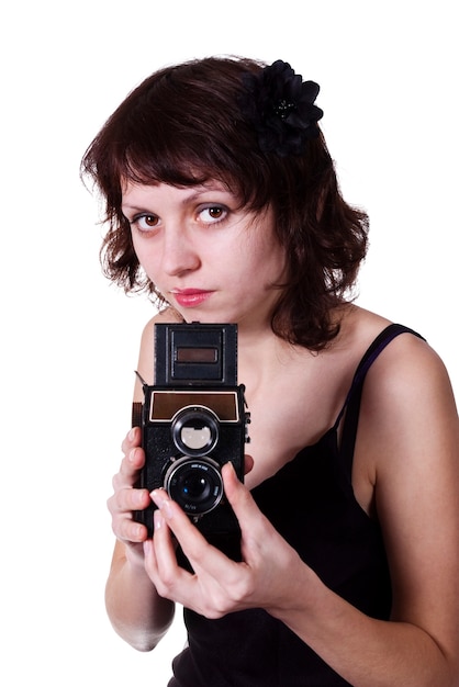 Menina com câmera reflex de lente dupla