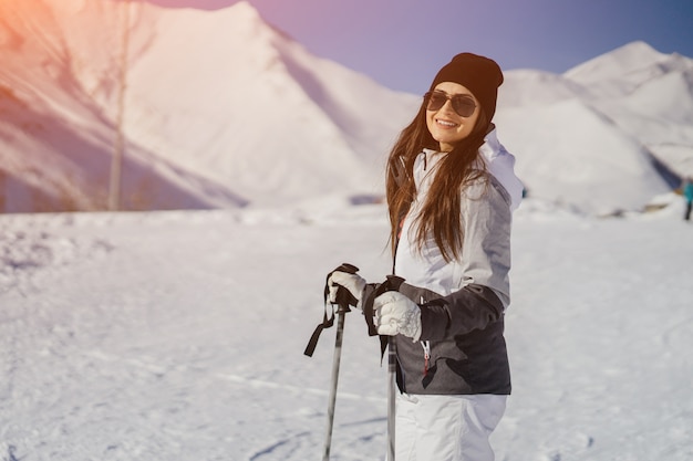 menina com esqui