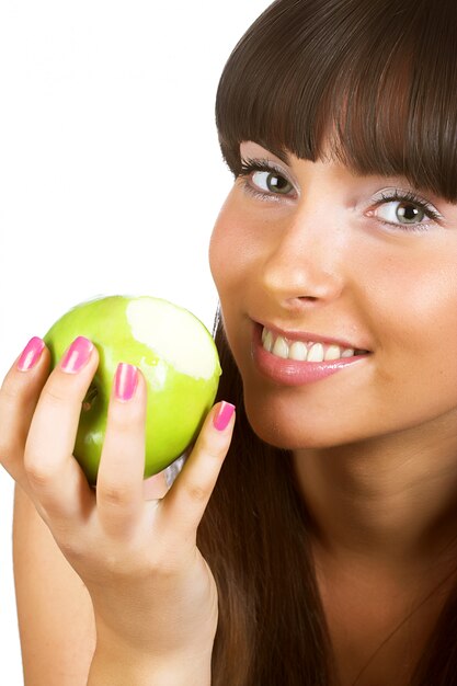 Menina jovem, comer, maçã verde