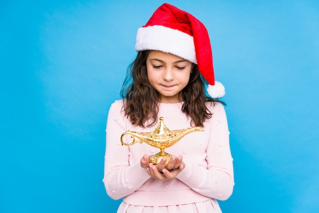 Menina pedindo um desiree comemorando o dia de Natal