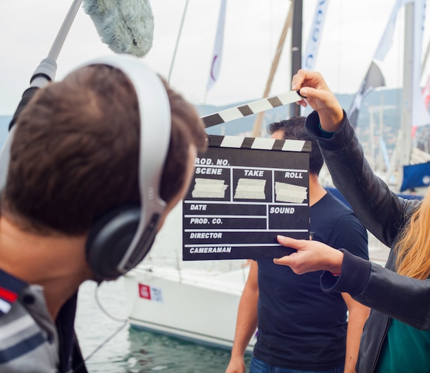 Menina, segurando, clapperboard