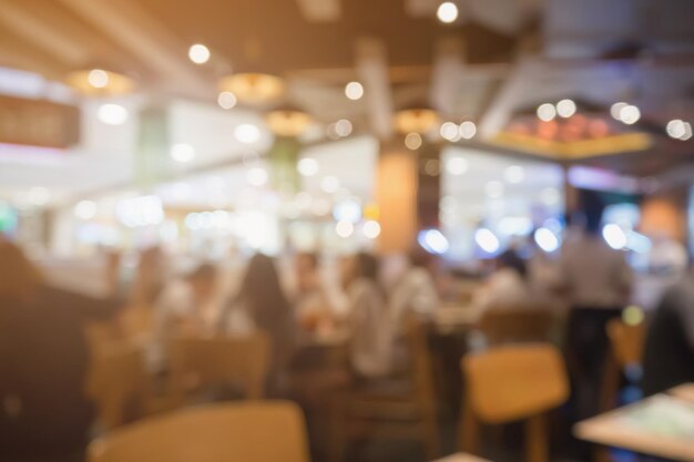 Menschen im Restaurant-Café-Interieur mit Bokeh-Licht verwischten den abstrakten Hintergrund des Kunden