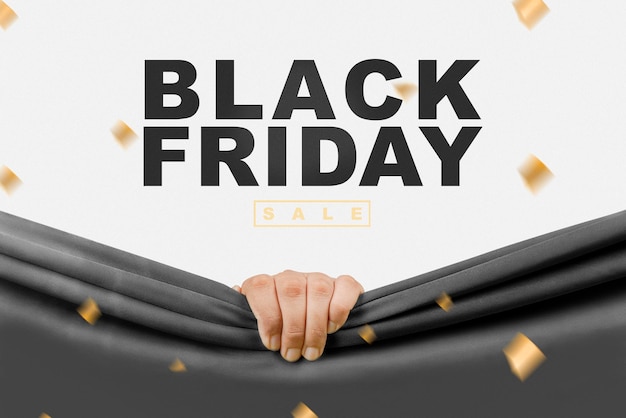 Menschliche Hand öffnet schwarzen Vorhang mit Black Friday-Verkaufstext