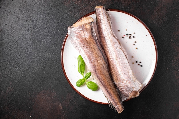 merluza pescado crudo filete blanco marisco fresco listo para comer comida snack en la mesa copia espacio comida