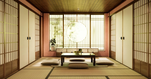 mesa baja y almohada en la alfombra tatami en el piso de la habitación estilo japonés