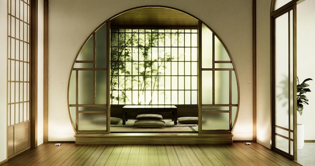 mesa baja y almohada en el piso de madera habitación estilo japonés