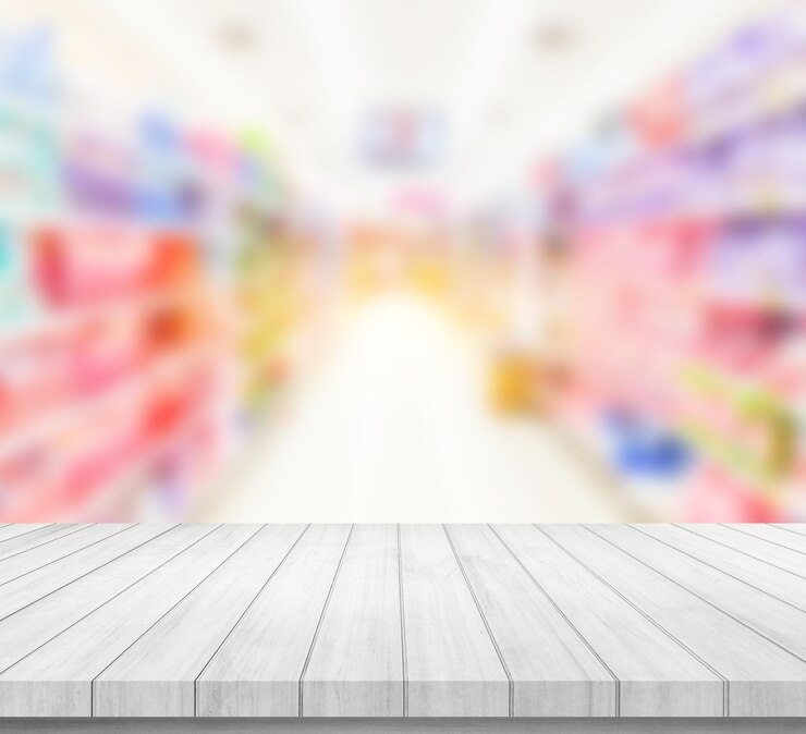 Foto mesa de madeira ou piso de madeira com fundo desfocado de supermercado para exibição de produto