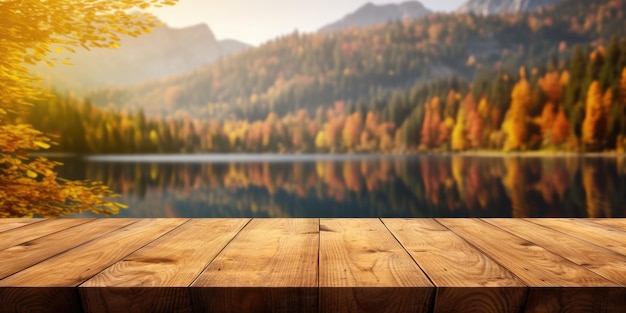 La mesa de madera vacía con el fondo borroso del lago y la montaña en otoño Imagen exuberante