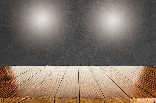 Foto mesa de madera vacía con fondo gris y puntos de luz plantilla de exhibición de productos