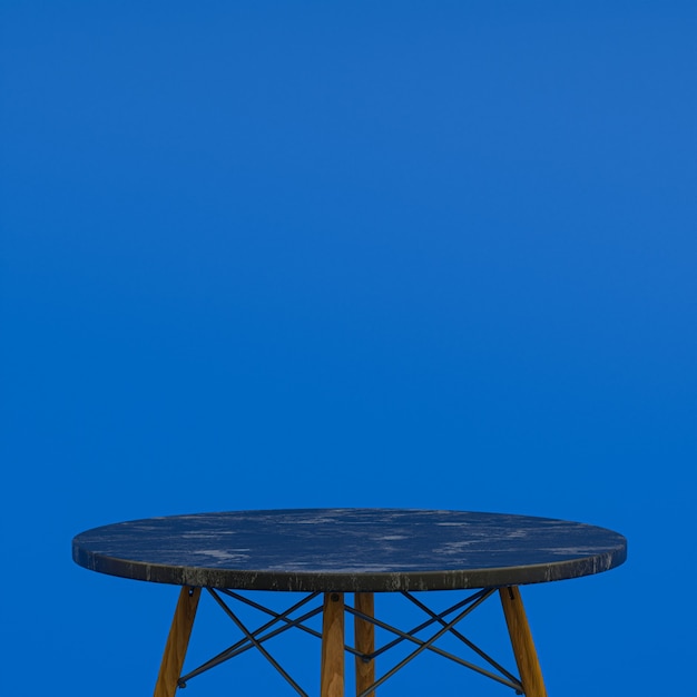 Mesa de mármol negro o soporte de producto para mostrar el producto sobre fondo azul.